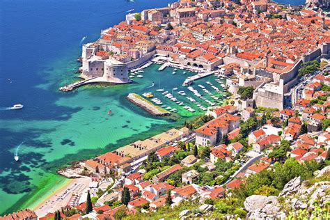 Town of Dubrovnik UNESCO world heritage site aerial harbor view Photograph by Brch Photography ...