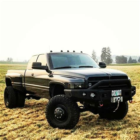 All black 2nd gen lifted dually Ram | Jacked up trucks, Cummins trucks, Dodge diesel trucks