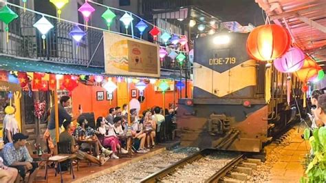 Hanoi's 'train street' cafes begin to reopen after 3-year hiatus - Nikkei Asia