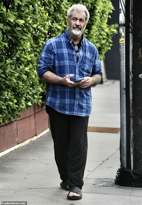 Mel Gibson, 67, goes ultra casual in plaid shirt and RUBBER SLIDES as ...