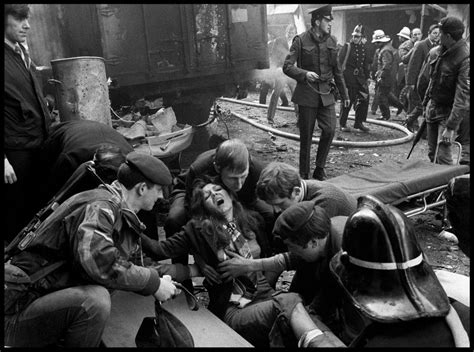 A woman wounded by an IRA bomb explosion in the city centre, is given first aid. Belfast ...