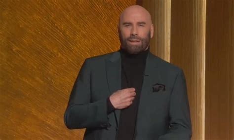 John Travolta got emotional when introducing the 'In Memoriam' segment at the Oscars