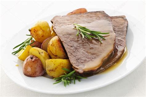 Roast beef and potatoes — Stock Photo © elenathewise #4465552