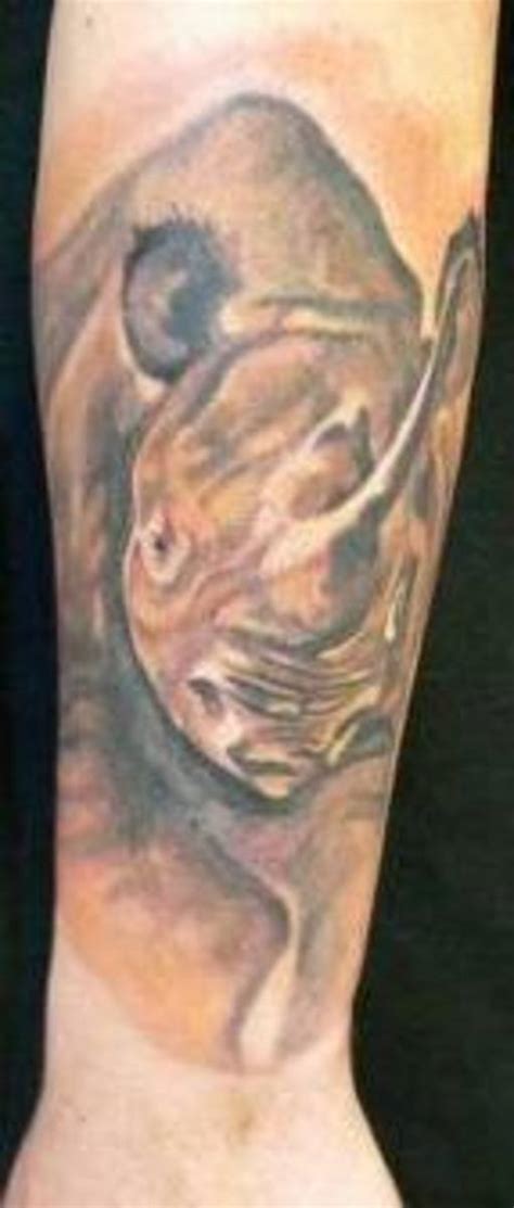 Rhino Tattoos And Designs-Rhino Tattoo Meanings And Ideas-Rhino Tattoo Pictures | HubPages