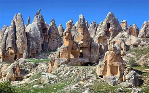 Uçhisar rock houses in the Cappadocia region of Turkey | House on the rock, Cappadocia ...