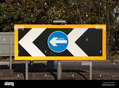 Roundabout road sign hi-res stock photography and images - Alamy