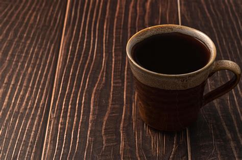 Coffee cup on the table 2081081 Stock Photo at Vecteezy