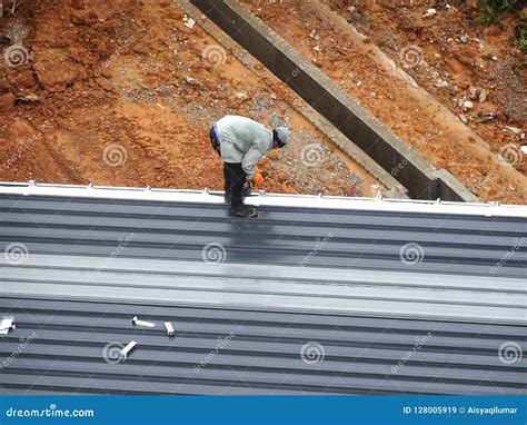 Installation of Metal Deck Roof Sheet by Construction Workers. Editorial Stock Image - Image of ...