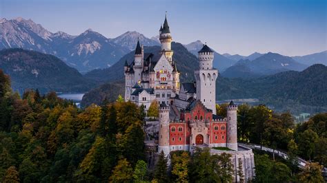 Famous Neuschwanstein Castle in Bavaria, Germany, before sunrise ...