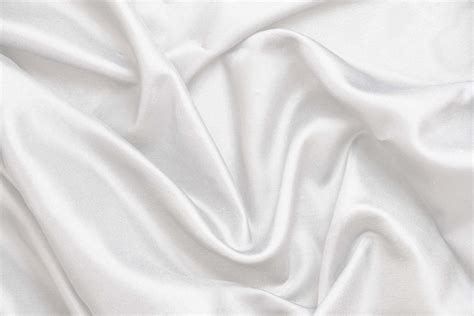 Smooth elegant white silk fabric or satin luxury cloth texture for ...