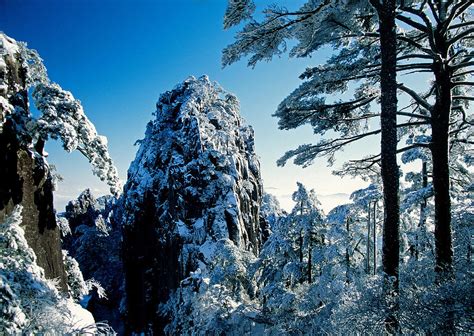 Huangshan winter peak Photograph by Dennis Cox - Fine Art America