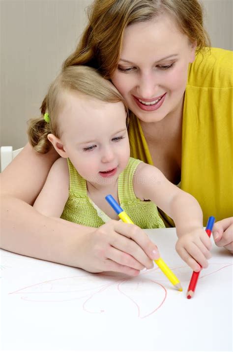 Mother and child painting stock image. Image of child - 22003709