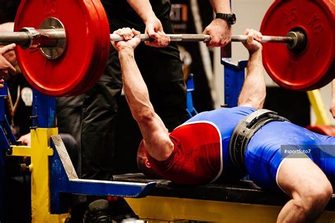 male powerlifter bench press in powerlifting competition | Bench press ...