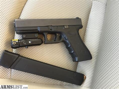 ARMSLIST - For Sale/Trade: Glock 22 with laser sight