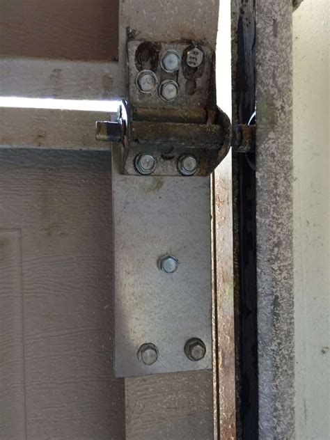 How To Repair a Garage Door Hinge - Learn Garage Doors