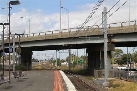 New overhead stanchions and wire in place at Huntingdale station - Wongm's Rail Gallery