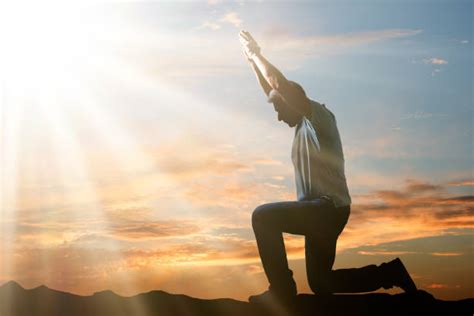 Kneeling In Prayer Stock Photos, Pictures & Royalty-Free Images - iStock