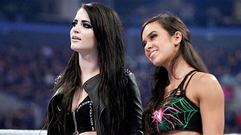 AJ Lee & Paige unite in a war of words with Nikki & Brie Bella ...