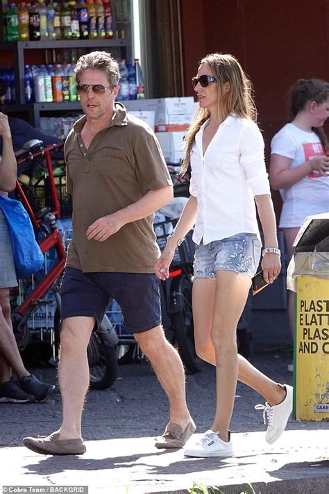 Hugh Grant joins leggy wife Anna Eberstein on low-key stroll in Capri ...