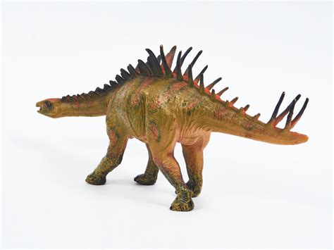 Dinosaur rubber toy isolated on white 2487143 Stock Photo at Vecteezy