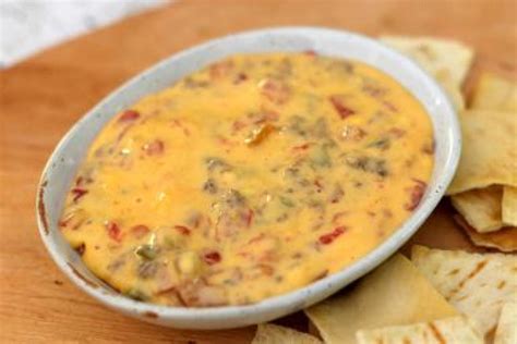 Crock Pot Rotel Dip with Ground Beef and Cheese Recipe | Just A Pinch Recipes