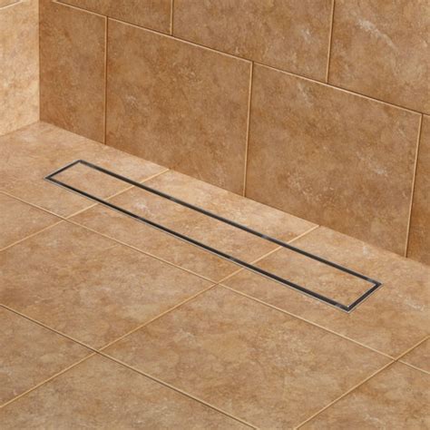 Large format floor tile lineup with linear shower drain help