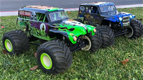 LOSI SON-UVA DIGGER & GRAVE DIGGER-LMT First Running Video & Power Up ...