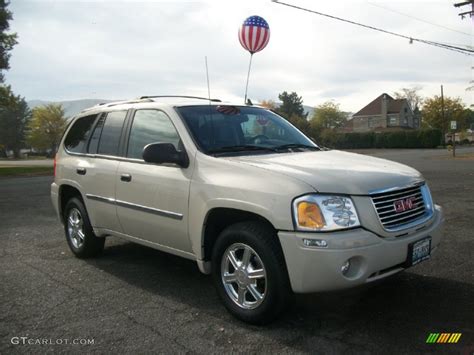 Sand Beige Metallic 2009 GMC Envoy SLE 4x4 Exterior Photo #72865641 | GTCarLot.com