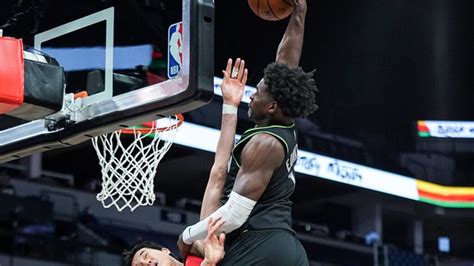 Timberwolves Anthony Edwards Dunk over Raptors Yuta Watanabe one for ...