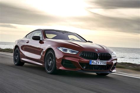 The new BMW M850i xDrive Coupe in colour Sunset Orange and 20" M light ...