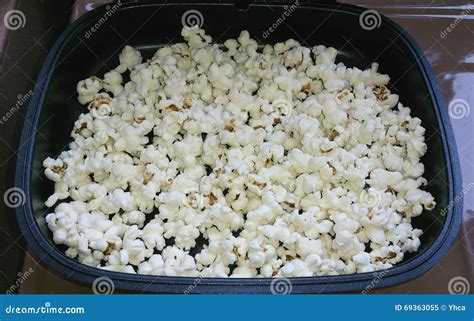 Popcorn in pan stock image. Image of food, snack, yellow - 69363055