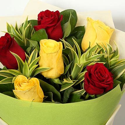 Online 12 Red And Yellow Roses Bouquet Gift Delivery in Singapore - FNP
