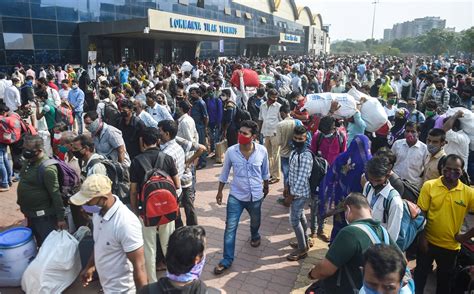 Mumbai: Passengers rush outside Lokmanya Tilak Terminus to board trains ...