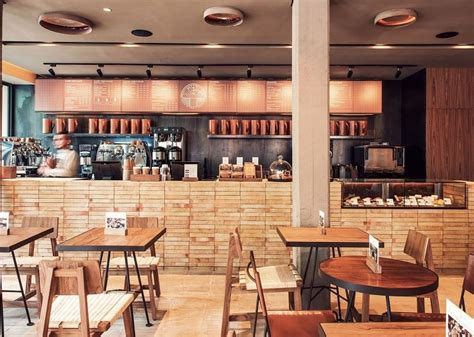 Bright interior with earth colors and wooden elements in the cafe Tierra Garat