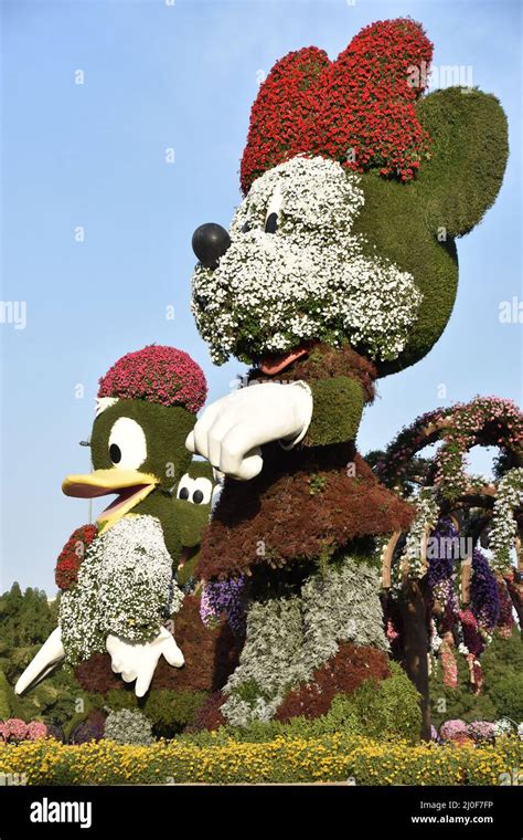 Disney characters at Dubai Miracle Garden in the UAE Stock Photo - Alamy