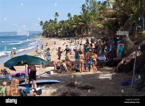 Surfers gather on Puntas beach for a party in Rincon Puerto Rico Stock ...