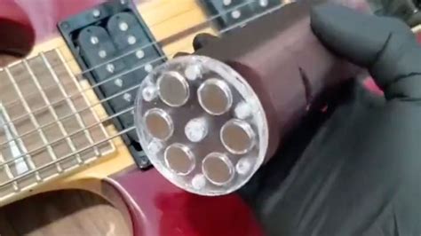 This guitarist has invented an evolution of the EBow that works on multiple strings and spins ...