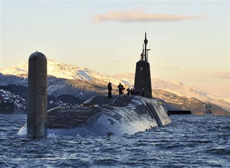 Nuclear submarine HMS Vanguard arrives back at HM Naval Base Clyde, Faslane, Scotland following ...