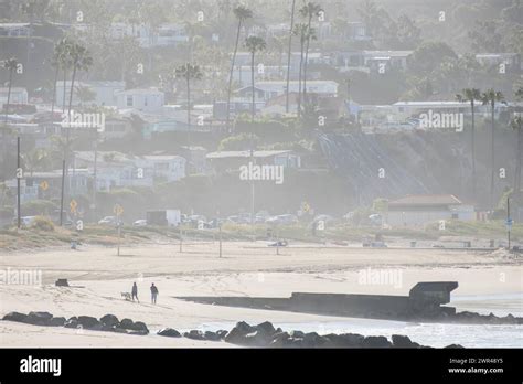 Surfing at sunset Beach in Pacific Palisades, California, USA Stock ...