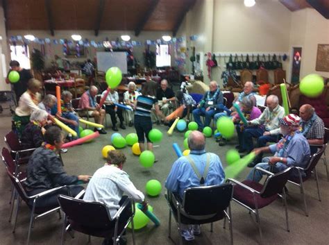 Pool "noodles" and balloons. Staying active and having fun all at the same time! Aspen Senior ...