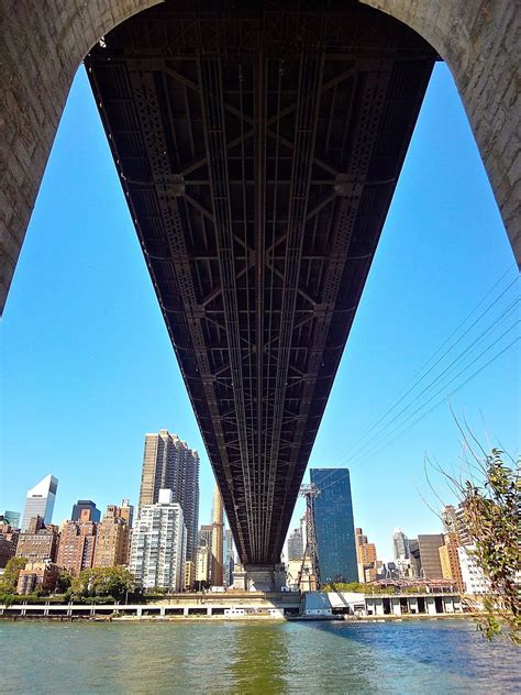 Under The 59th Street Bridge from Roosevelt Island, NYC | Roosevelt island, City landscape, Nyc ...