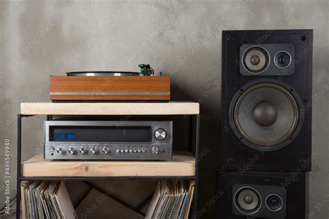 HiFi system with turntable, amplifier, headphones and lp vinyl records ...