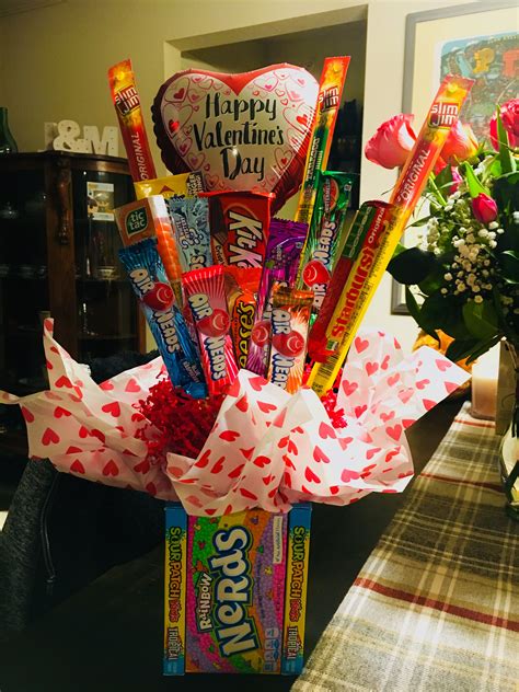 a valentine's day candy bouquet in a vase