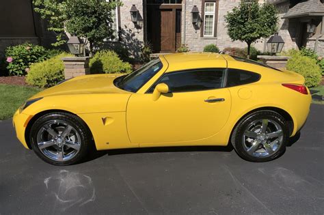 Bid for the chance to own a 2,600-Mile 2009 Pontiac Solstice Coupe GXP 5-Speed at auction with ...