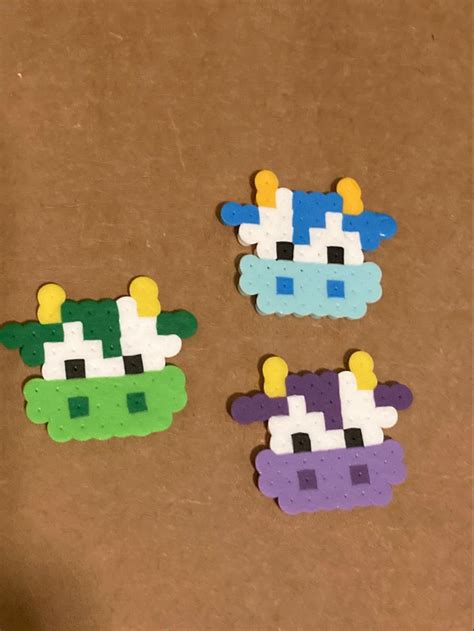 blue green purple cows perler bead pixel art in 2023 | Diy perler bead crafts, Easy perler beads ...