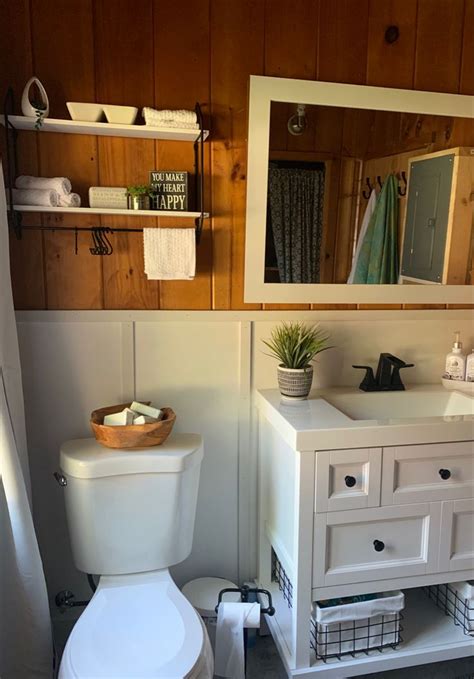 Bathroom knotty pine white accents. | Knotty pine walls, Cabin bathrooms, Cabin interior