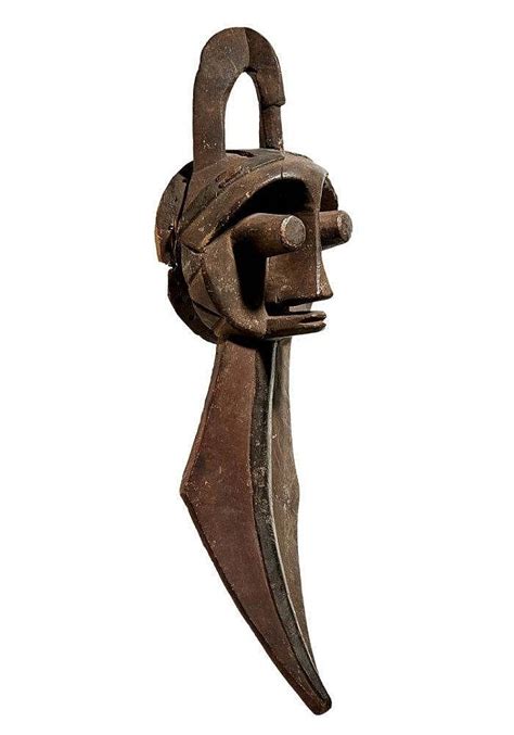 Sold at Auction: A YORUBA IJEBU MASK | Metal mask, Mask, African masks