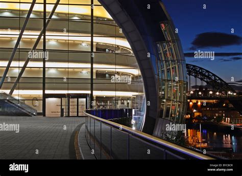 The Sage Gateshead at night with Newcastle Tyne bridge in background Stock Photo - Alamy