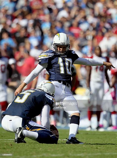 Nate Kaeding of the San Diego Chargers kicks the ball from Mike... News ...