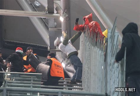 2 March 2014: Legia and Jagiellonia fans clash in stands during match ...